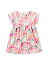 Load image into Gallery viewer, Tea Collection - Empire Baby Dress - Island Rainbow in Chalk