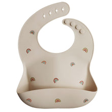 Load image into Gallery viewer, Mushie Silicone Baby Bib - Rainbows